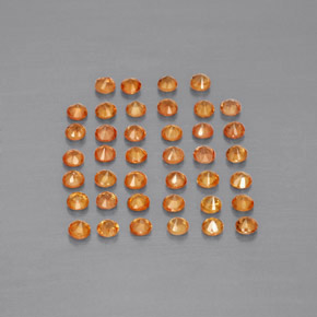 カラットの天然オレンジサファイア（1.81 mm・ラウンドカット）