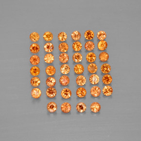 カラットの天然オレンジサファイア（1.83 mm・ラウンドカット）