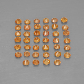 カラットの天然オレンジサファイア（1.83 mm・ラウンドカット）
