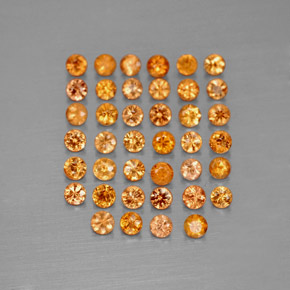カラットの天然オレンジサファイア（1.73 mm・ラウンドカット）