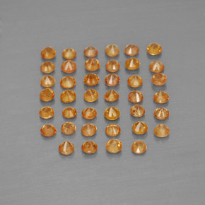 カラットの天然オレンジサファイア（1.73 mm・ラウンドカット）