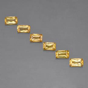 カラットの天然ゴールデンイエローサファイア（4.9×3 mm・エメラルドカット）