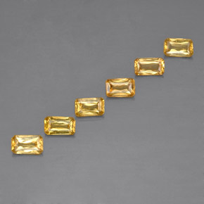 カラットの天然ゴールデンイエローサファイア（4.9×3 mm・エメラルドカット）
