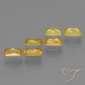 1.86カラットの天然Medium-Light Orange-Gold サファイア（4.9×2.9 mm・エメラルドカット）