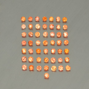カラットの天然オレンジサファイア（1.82 mm・ラウンドカット）