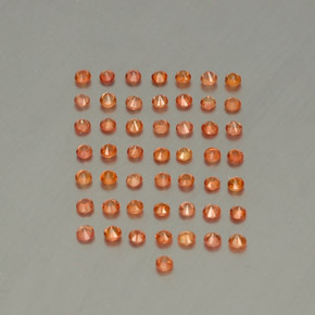 カラットの天然オレンジサファイア（1.82 mm・ラウンドカット）