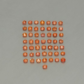 カラットの天然オレンジサファイア（1.84 mm・ラウンドカット）