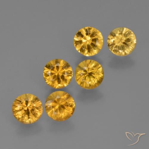 Shop natural 2.27ct 濃いゴールデンオレンジ サファイア gems, ラウンド, from タンザニア at GemSelect. In stock, global shipping!
