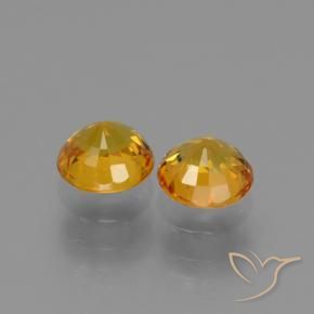 Shop natural 1.36ct 濃いオレンジゴールド サファイア gems, ラウンド, from タンザニア at GemSelect. In stock, global shipping!