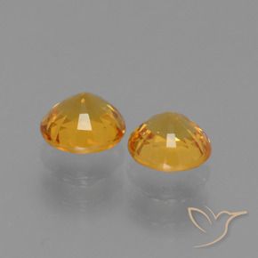 Shop natural 1.35ct 濃いゴールデンオレンジ サファイア gems, ラウンド, from タンザニア at GemSelect. In stock, global shipping!