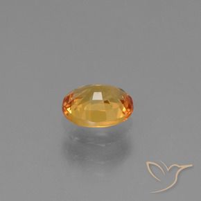 0.79カラットの天然オレンジゴールドサファイア、楕円形、VS