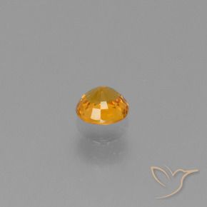 0.60カラットの天然アプリコットオレンジサファイア、ラウンド、VVS-VS