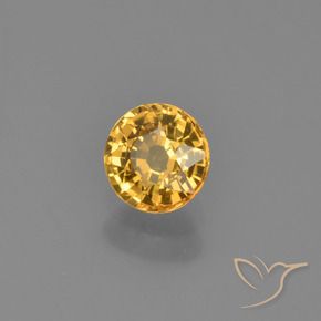 0.62カラットの天然濃いゴールデンオレンジサファイア、ラウンド、VVS-VS