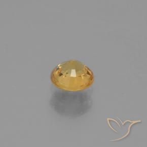 0.58カラットの天然ミディアムオレンジサファイア、ラウンド、VVS-VS
