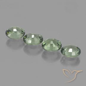Shop natural 3.17ct 薄いフォレストグリーン サファイア gems, 楕円形, from タンザニア at GemSelect. In stock, global shipping!