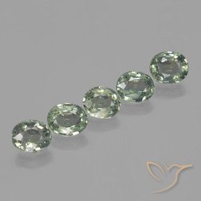 Shop natural 4.19ct 薄いフォレストグリーン サファイア gems, 楕円形, from タンザニア at GemSelect. In stock, global shipping!