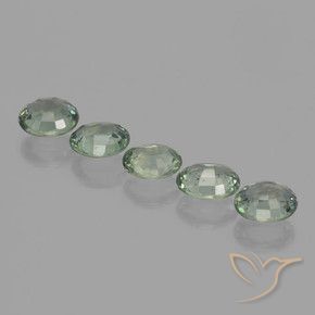 Shop natural 4.19ct 薄いフォレストグリーン サファイア gems, 楕円形, from タンザニア at GemSelect. In stock, global shipping!