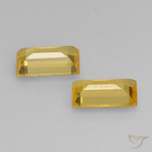 Shop natural 0.65ct ゴールドオレンジ サファイア gems, バゲット, from タンザニア at GemSelect. In stock, global shipping!