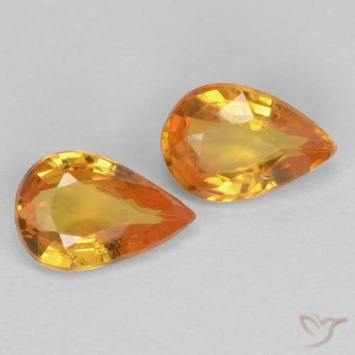 Shop natural 0.90ct ゴールド サファイア gems, 洋梨の形, from タンザニア at GemSelect. In stock, global shipping!