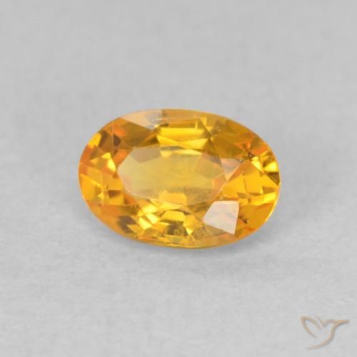 0.62カラットの天然Medium Light Orange-Goldサファイア、楕円形、VVS-VS