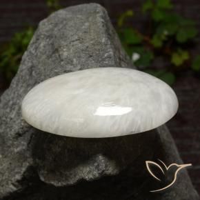 29.06カラットの天然薄いホワイトスコレサイト、オーバルカット、オペーク