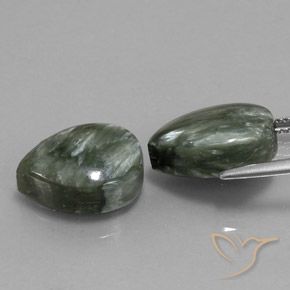 Shop natural 12.57ct アーシーグリーン セラフィナイト gems, 洋梨の形, from ロシア at GemSelect. In stock, global shipping!