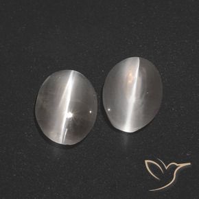 Shop natural 2.57ct 非常に薄い灰色 シリマナイトキャッツアイ gems, 楕円形, from マダガスカル at GemSelect. In stock, global shipping!