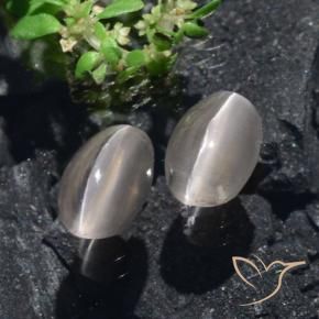 Shop natural 2.20ct 非常に薄い灰色 シリマナイトキャッツアイ gems, 楕円形, from マダガスカル at GemSelect. In stock, global shipping!