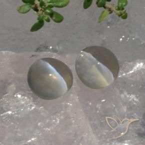 Shop natural 3.07ct 非常に薄い灰色 シリマナイトキャッツアイ gems, 楕円形, from マダガスカル at GemSelect. In stock, global shipping!