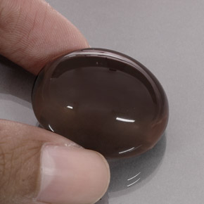 68.97カラットの天然スモーキーブラウンスモーキークォーツ（28.1×23.7 mm・透明）