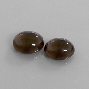 カラットの天然スモーキーブラウンスモーキークォーツ（10.8×8.8 mm・オーバルカット）