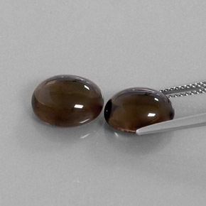 カラットの天然スモーキーブラウンスモーキークォーツ（10.8×8.8 mm・オーバルカット）