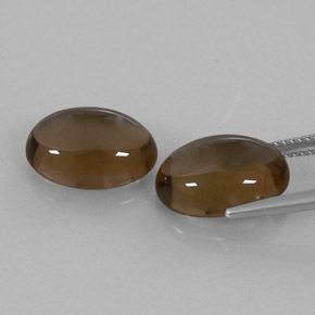 カラットの天然スモーキーブラウンスモーキークォーツ（14.1×10.2 mm・オーバルカット）