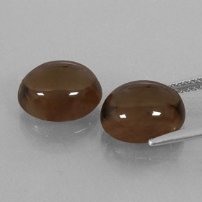 カラットの天然スモーキーブラウンスモーキークォーツ（10.9×9.1 mm・オーバルカット）