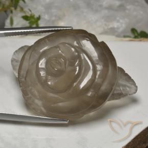 97.93カラットの天然非常に薄い茶色スモーキークォーツ、フラワーカット、透明