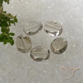 Shop natural 5.89ct 茶色がかった白 スモーキークォーツ gems, 楕円形, from ブラジル at GemSelect. In stock, global shipping!