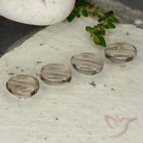 Shop natural 4.62ct 薄いアンバーブラウン スモーキークォーツ gems, 楕円形, from ブラジル at GemSelect. In stock, global shipping!