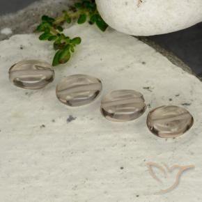 Shop natural 4.62ct 薄いアンバーブラウン スモーキークォーツ gems, 楕円形, from ブラジル at GemSelect. In stock, global shipping!
