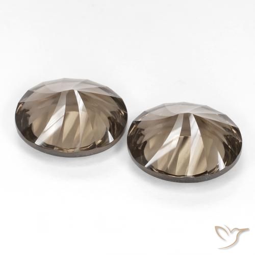 Shop natural 13.67ct ミディアム薄いブラウン スモーキークォーツ gems, 楕円形, from ブラジル at GemSelect. In stock, global shipping!
