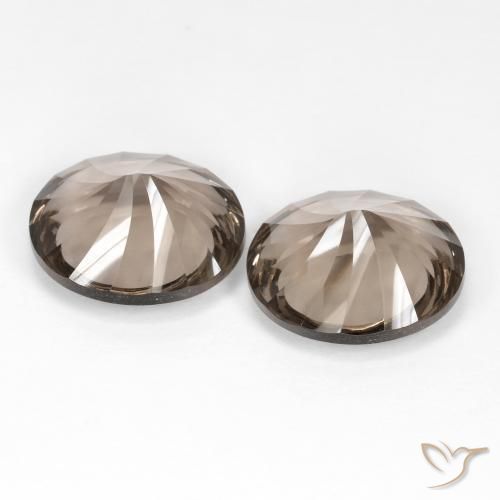 Shop natural 13.90ct 薄いアンバーブラウン スモーキークォーツ gems, 楕円形, from ブラジル at GemSelect. In stock, global shipping!
