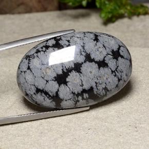 39.18カラットの天然マルチカラースノーフレークオブシディアン（32.7×20.9 mm・オーバルカット）