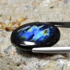 10.68カラットの天然マルチカラースペクトロライト、オーバルカット、オペーク