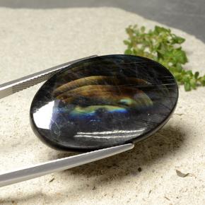 27.41カラットの天然マルチカラースペクトロライト、オーバルカット、オペーク