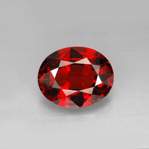 7.03カラットの天然オレンジレッドスペサルティンガーネット（12.5×10.2 mm・オーバルカット）