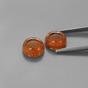 カラットの天然マンダリンオレンジスペサルティンガーネット（6.96 mm・透明）