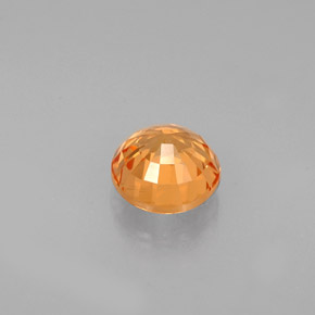 0.84カラットの天然マンダリンオレンジスペサルティンガーネット（5.14 mm・ラウンドカット）