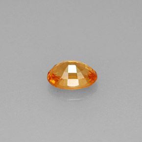 0.71カラットの天然マンダリンオレンジスペサルティンガーネット（6×4.2 mm・オーバルカット）