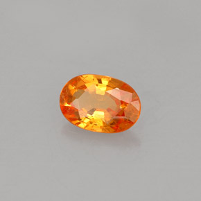 0.60カラットの天然オレンジスペサルティンガーネット（6×4.1 mm・オーバルカット）
