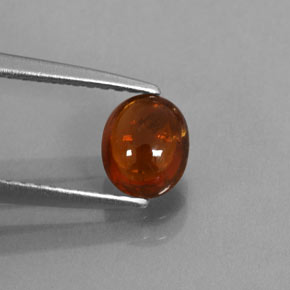 0.86カラットの天然ディープオレンジスペサルティンガーネット（6.2×5.1 mm・透明）