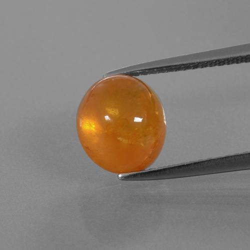 6.08カラットの天然アンバーオレンジスペサルティンガーネット（9.4×8.5 mm・オーバルカット）